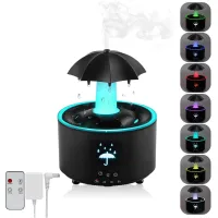 Quemador de incienso eléctrico, aromaterapia de escritorio giratoria, humidificador de gotas de lluvia giratorio (negro)