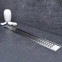 Canal de ducha de 55 cm para montaje en suelo con rejilla y desagüe incluidos, fabricado en acero inoxidable cromado.